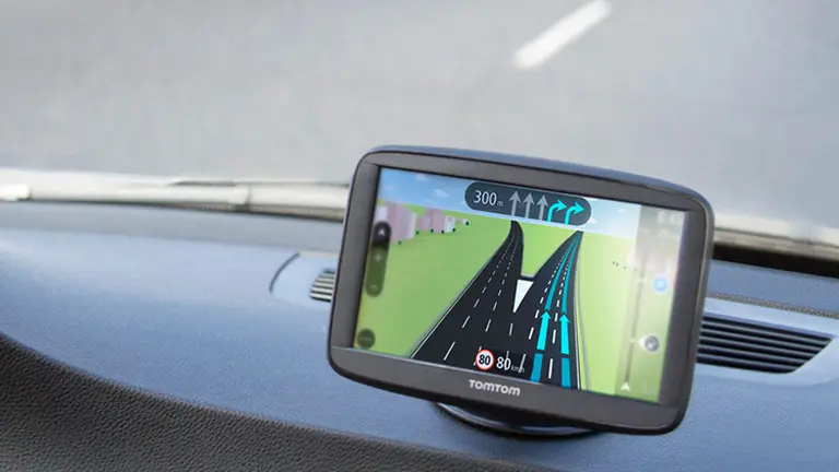 GPS Car Tracking Trends in 2026  system displaying real-time lane guidance and smart route directions inside a modern car dashboard in 2026