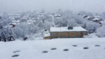 Heavy snow covering Highland Council school buildings and roads in Scotland on January 8, 2026 due to severe winter weather causing school closures