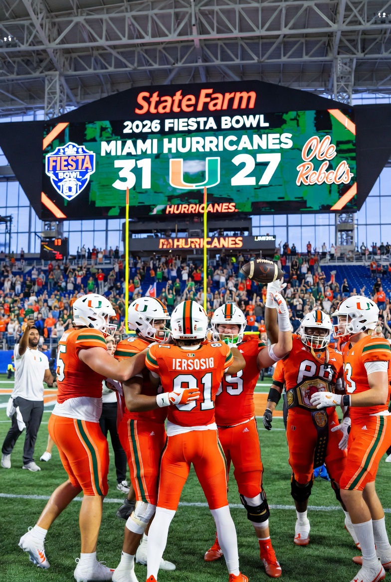 Carson Beck of the Miami Hurricanes scores the game-winning 3-yard touchdown run with 18 seconds left against Ole Miss Rebels in the 2026 Fiesta Bowl CFP semifinal at State Farm Stadium. (Miami Hurricanes vs Ole Miss Rebels Fiesta Bowl 2026)