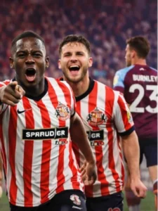 Sunderland players celebrate a 3-0 win over Burnley at the Stadium of Light, showing jubilation and excitement